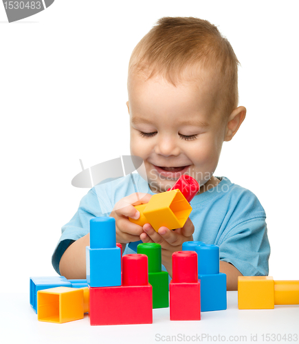 Image of Little boy with building bricks