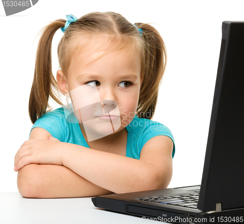 Image of Little girl with laptop