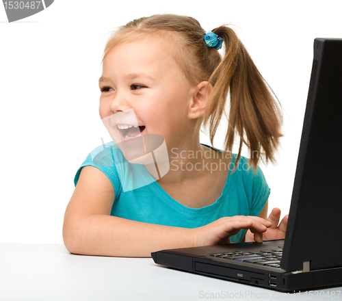 Image of Little girl with laptop