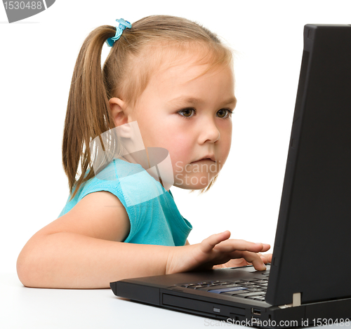 Image of Little girl with laptop