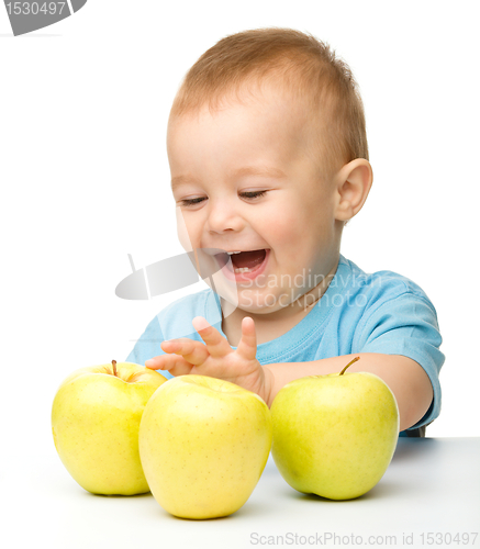 Image of Little boy with apple