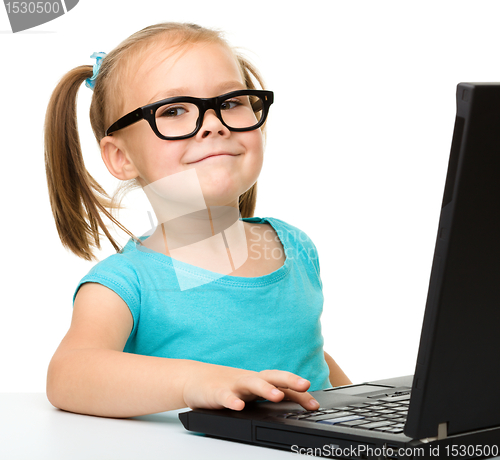 Image of Little girl with laptop