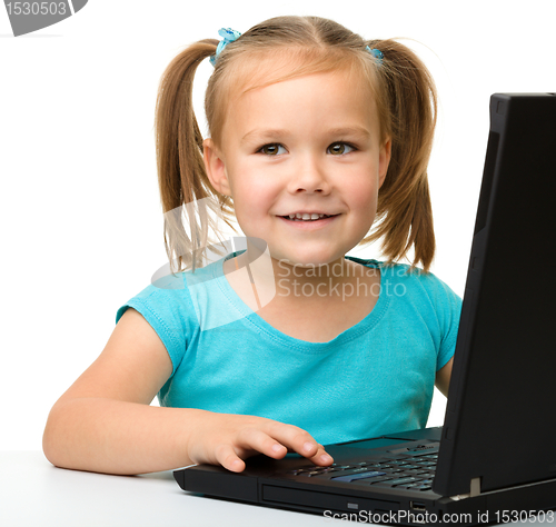Image of Little girl with laptop