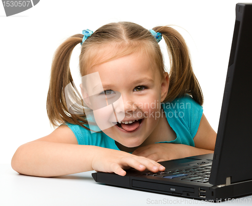 Image of Little girl with laptop