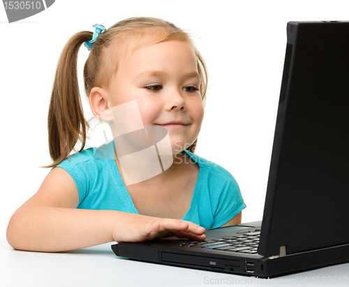 Image of Little girl with laptop