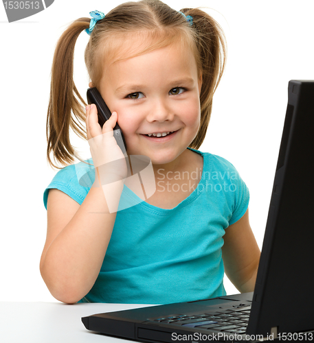 Image of Little girl with laptop