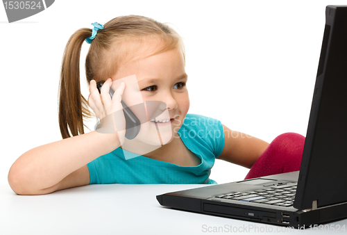Image of Little girl with laptop