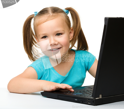 Image of Little girl with laptop