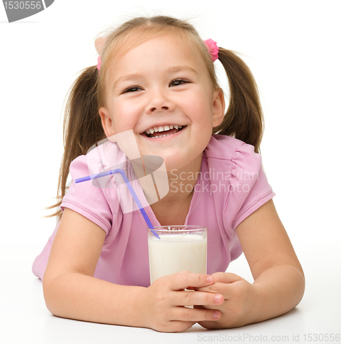 Image of Little girl with a glass of milk