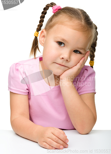 Image of Portrait of a sad little girl
