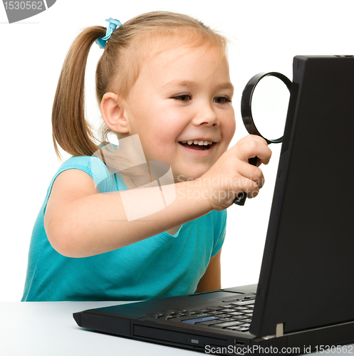 Image of Little girl with laptop