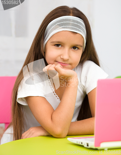 Image of Little girl with laptop