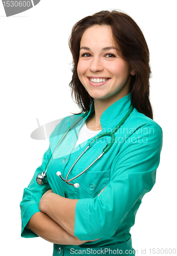 Image of Young attractive woman wearing a doctor uniform