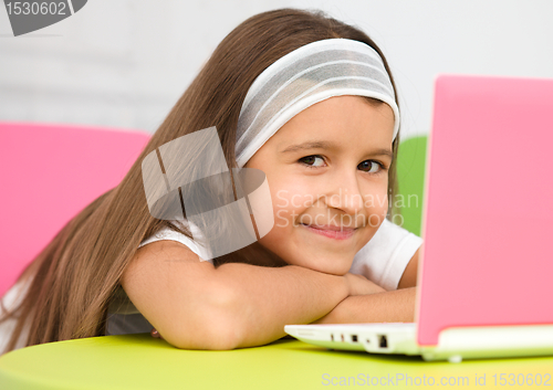 Image of Little girl with laptop