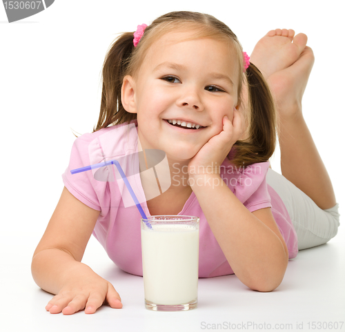 Image of Little girl with a glass of milk