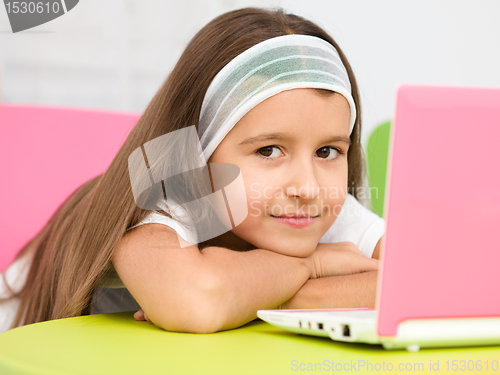 Image of Little girl with laptop