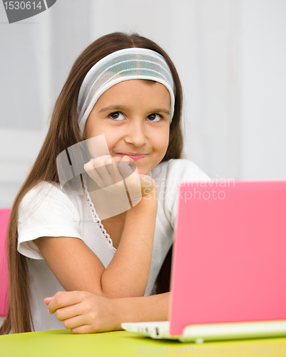 Image of Little girl with laptop