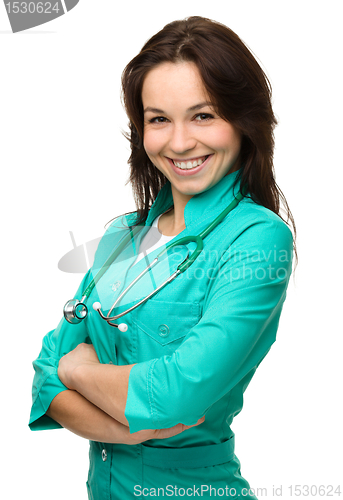 Image of Young attractive woman wearing a doctor uniform