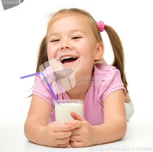 Image of Little girl with a glass of milk