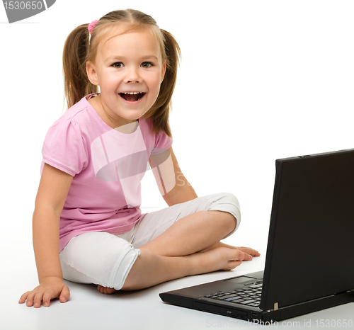 Image of Little girl with laptop