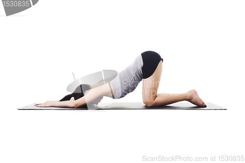 Image of Chinese woman doing yoga.