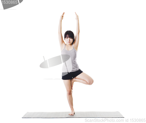 Image of Chinese woman doing yoga.