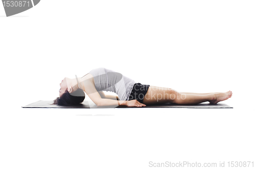 Image of Chinese woman doing yoga.