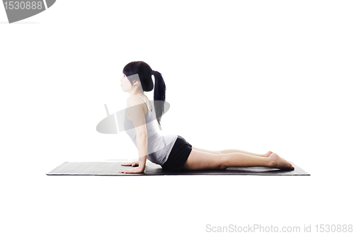 Image of Chinese woman doing yoga.