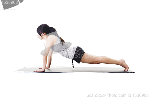 Image of Chinese woman doing yoga.