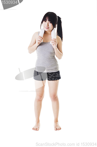 Image of Chinese girl lifting hand weights.