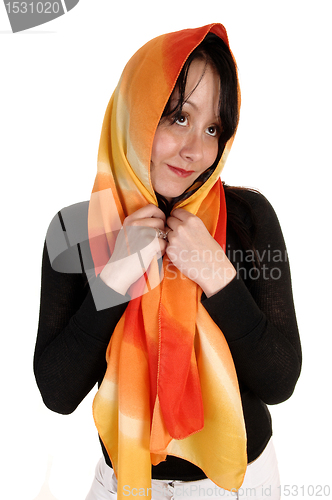 Image of Woman with head scarf.