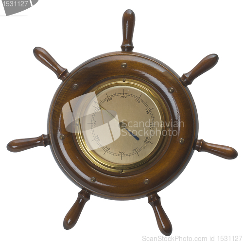 Image of Ship helms /steering wheel  barometer