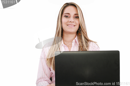 Image of Business woman using laptop in office
