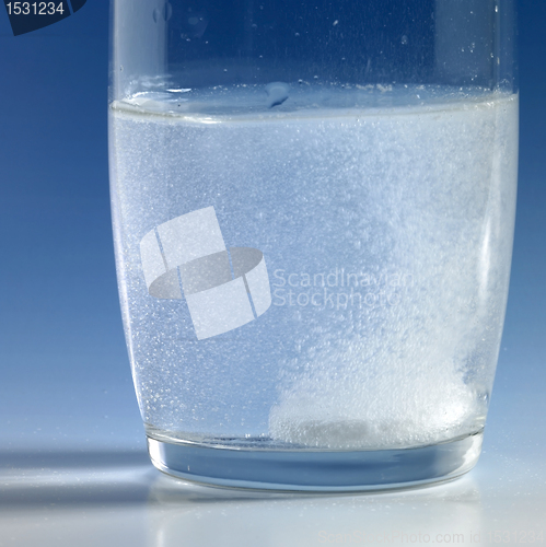 Image of fizzy tablet in a glass of water