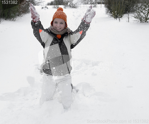 Image of girl having fun in the snow