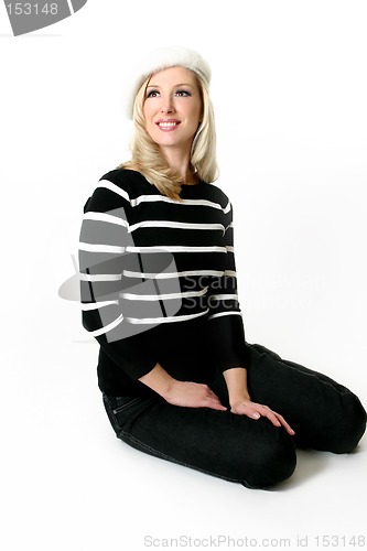 Image of Woman sitting on floor