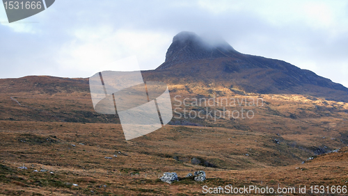 Image of scottish scenery with hill and clouds