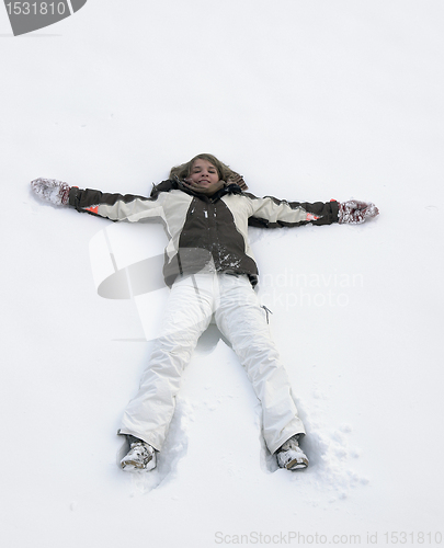 Image of girl having fun in the snow