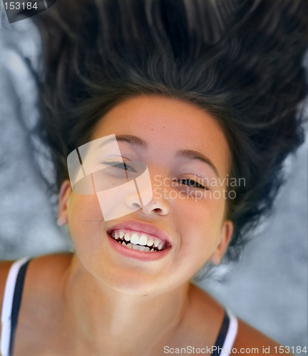 Image of Happy girl with her hair up