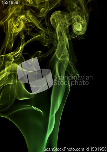 Image of green smoke in black back