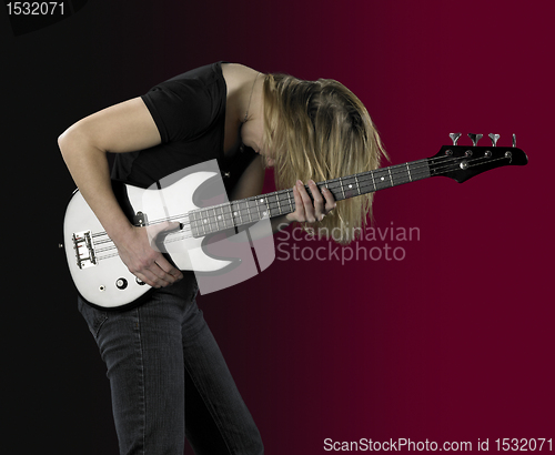 Image of playing bass guitar