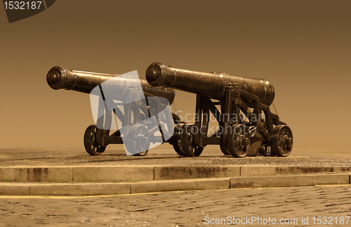 Image of outside scenery with nostalgic cannons