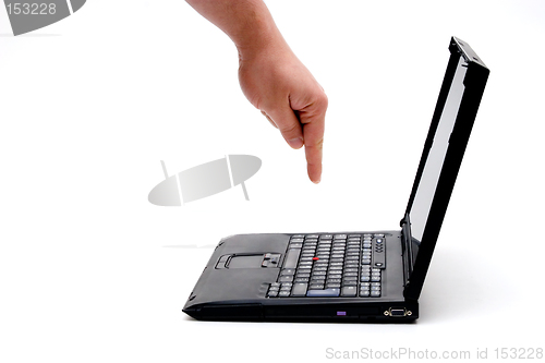 Image of hand on laptop