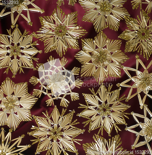 Image of decorative Christmas background with straw stars