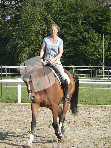 Image of girl while horse riding