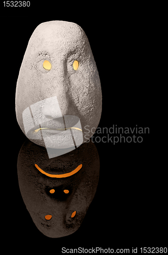 Image of illuminated sad ceramic head