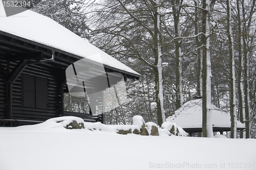 Image of cottage in winter ambiance