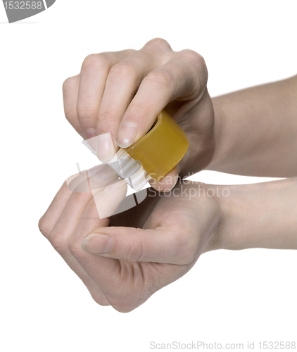 Image of hands cleaning nails with a scrubber