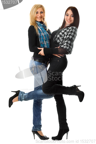 Image of Two smiling girls embracing