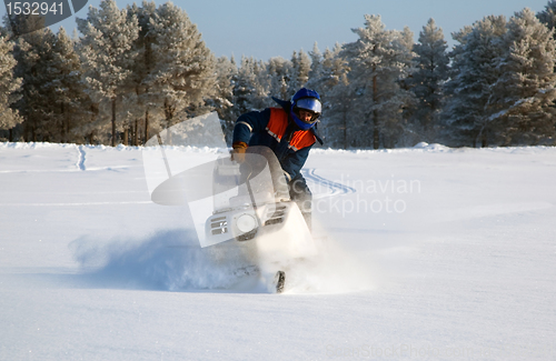 Image of Snowmobile at full speed